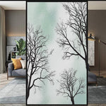 Load image into Gallery viewer, Black winter tree glass film on a room divider panel — Lolli &amp; Omi