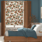 Load image into Gallery viewer, Ethnic blackout window blind with a repeating terracotta desert village of domes, arches and date palms - Lolli &amp; Omi