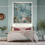 Load image into Gallery viewer, Tropical blackout window blind with a pink flamingo in a misty teal jungle framed by large foreground leaves - Lolli &amp; Omi